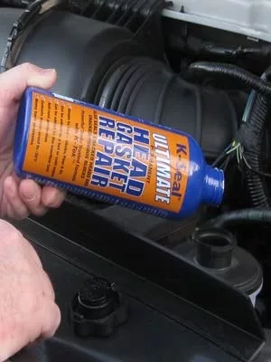 Pouring K-seal to stop coolant leaking from engine block